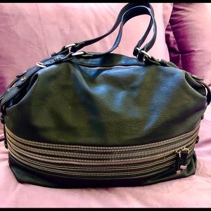 BIG BUDDAH Handbag with lots of zippers. Soft faux leather. NWOT